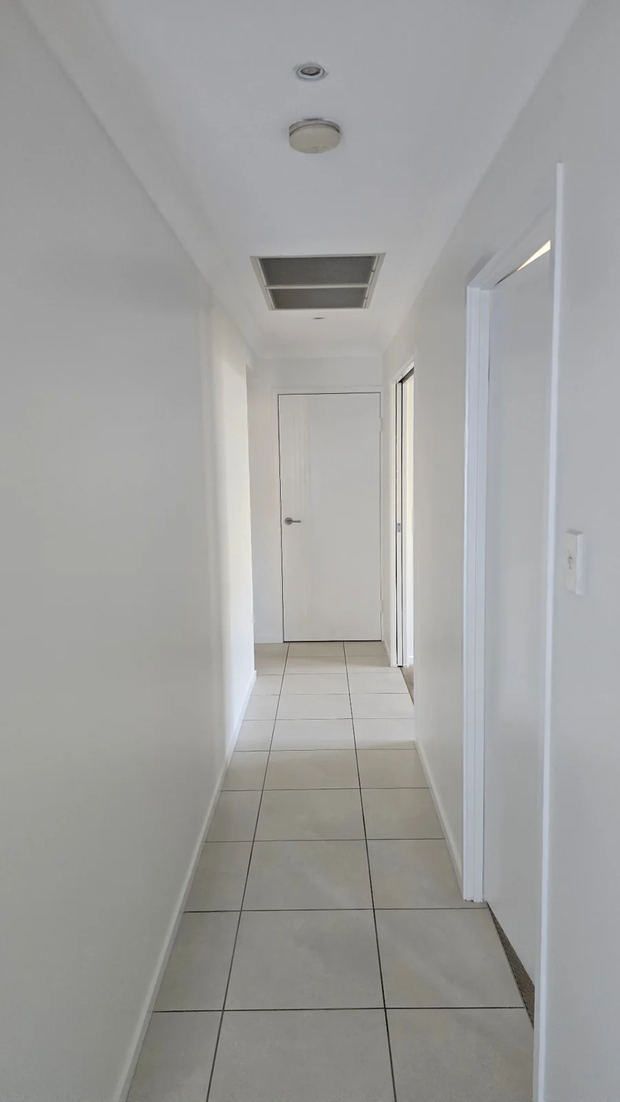 Freshly painted hallway after floor protection has been removed