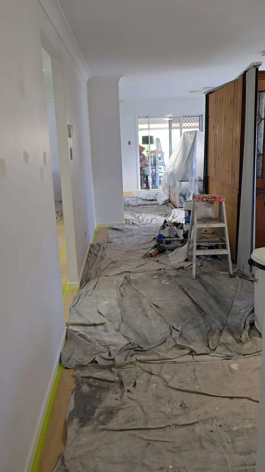 Drop sheets and furniture protection during an interior repaint